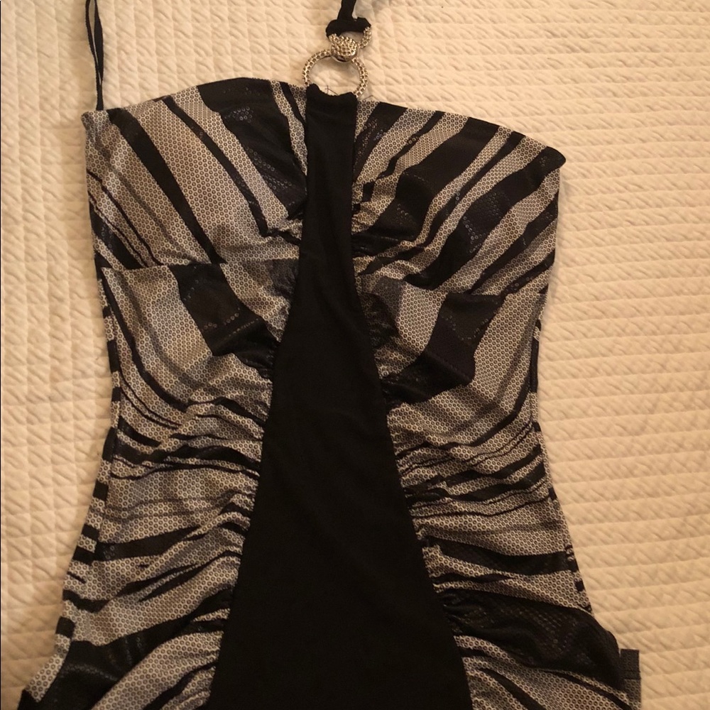 A black and silver grey ,  yoo n me halter top.